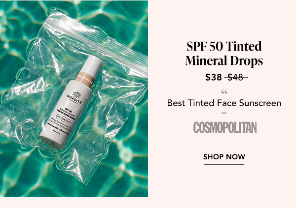 SPF 50 Tinted Mineral Drops: Bottle of SPF 50 Tinted Mineral Drops floating in pool water; named Best Tinted Face Sunscreen by Cosmopolitan, now $38.