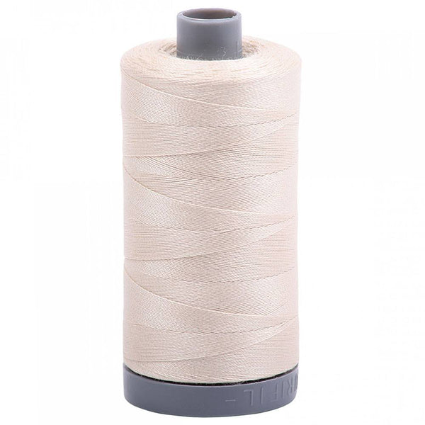 an image of a spool of thread on a white background