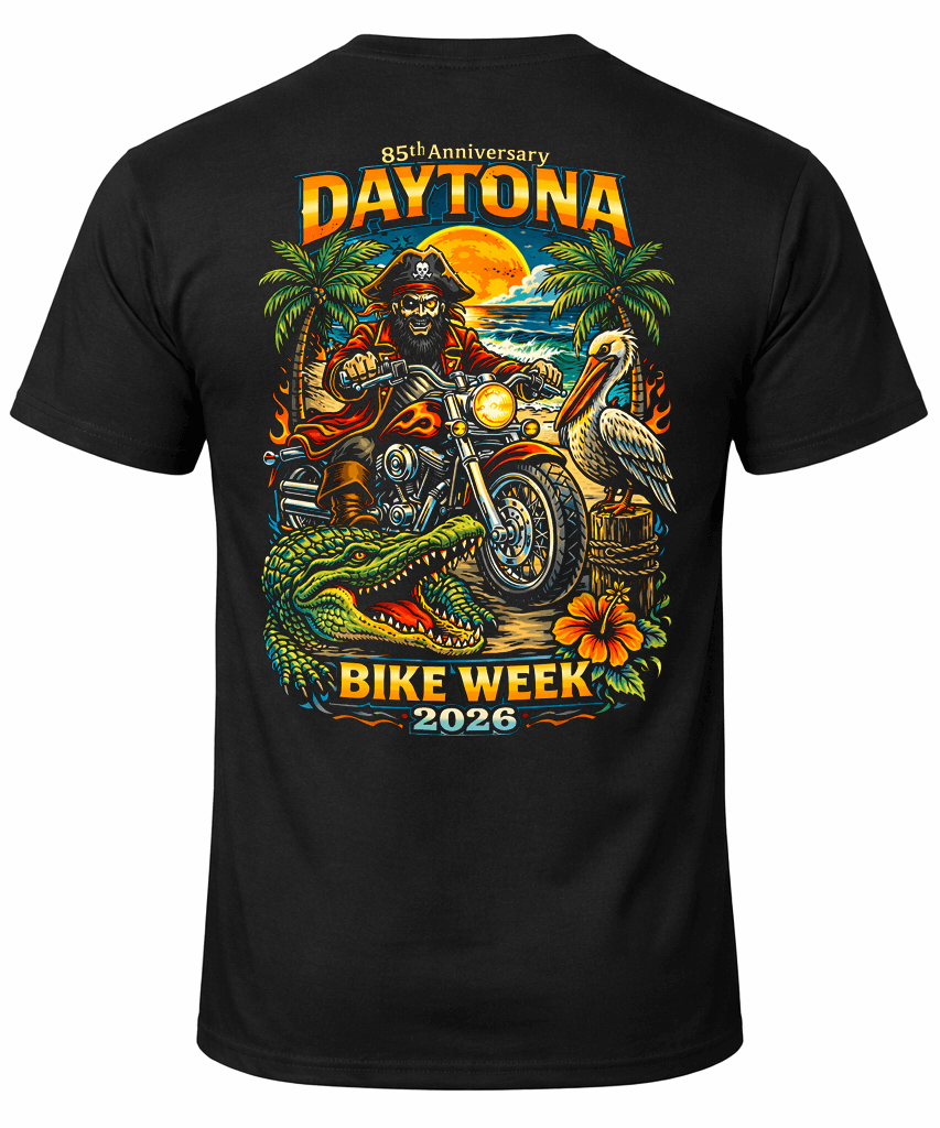 Rider on a Harley facing Mount Rushmore at golden hour, wearing the 2026 Sturgis Iron Bison tee