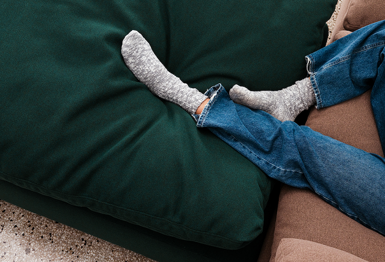 Pictured: The Sink Down Ottoman in Evergreen (Autumn).