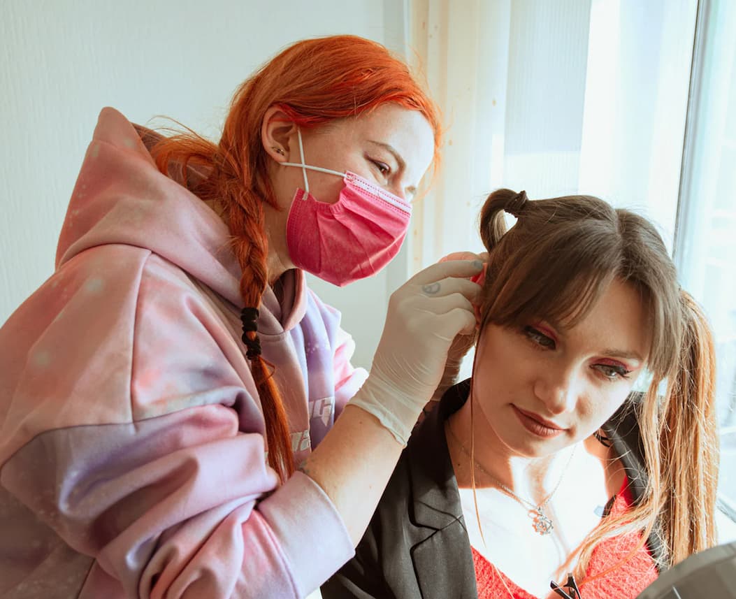 How do piercers avoid rejection & infection?