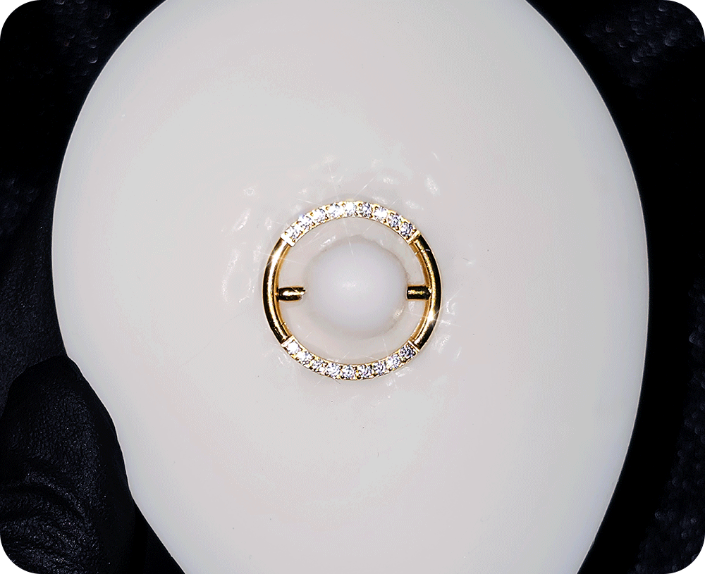 Hinged nipple clickers