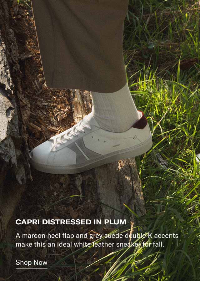 Capri Distressed in Plum A maroon heel flap and grey suede double K accents make this an ideal white leather sneaker for fall. Shop Now