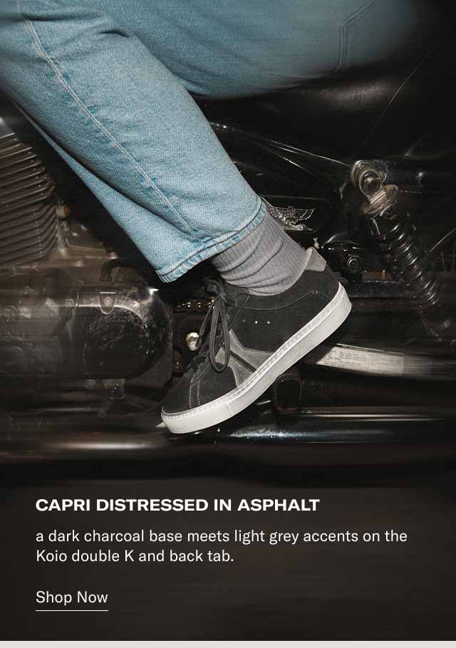 Capri Distressed in Asphalt a dark charcoal base meets light grey accents on the Koio double K and back tab.Shop Now