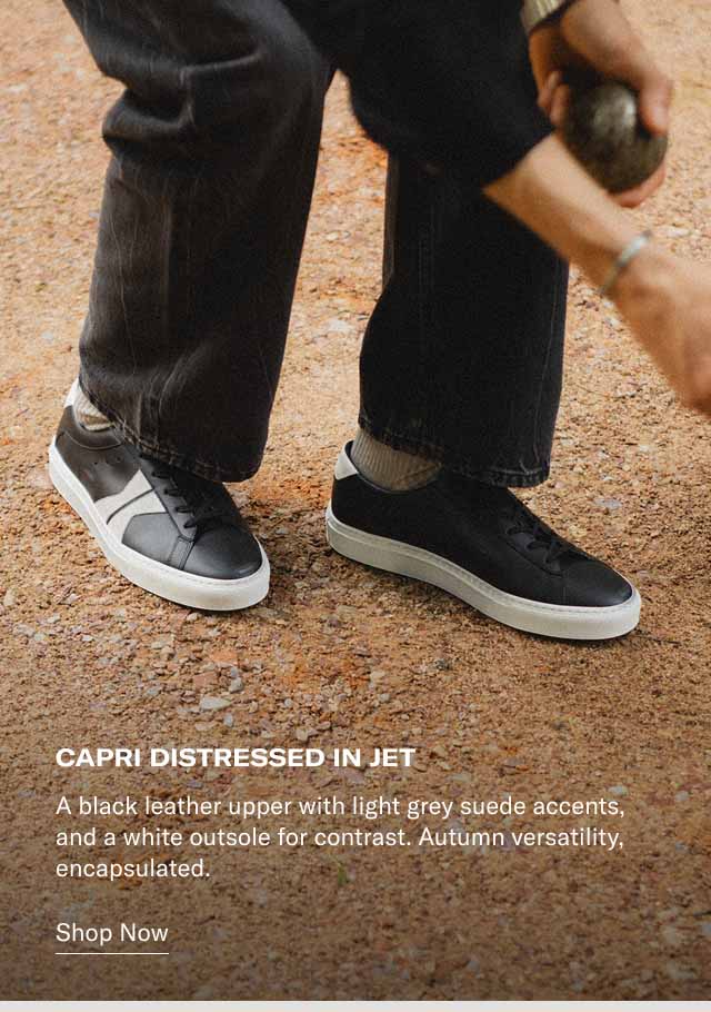 Capri Distressed in Jet A black leather upper with light grey suede accents, and a white outsole for contrast. Autumn versatility, encapsulated. Shop Now